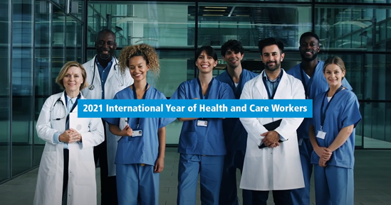 Video thumbnail of health workers standing in a group and with the text "2021 International Year of Health and Care Workers".