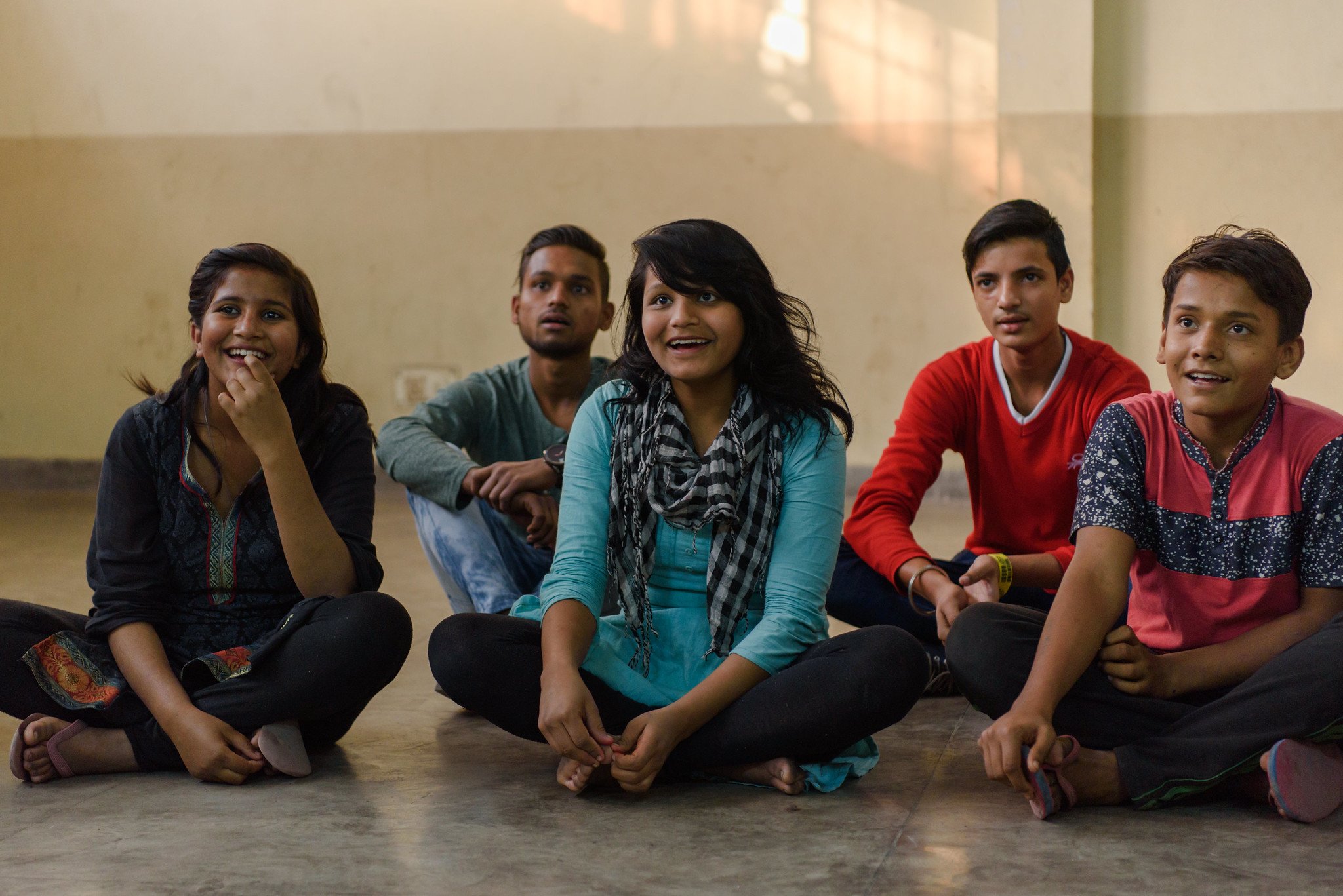 Young people participate in a sexuality education session, India