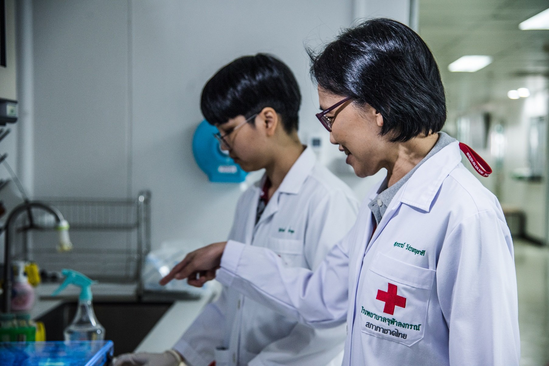 Dr. Supaporn Wacharapluesadee and one of her team members who worked on the first COVID-19 case validation at Thai Red Cross Emerging Infectious Diseases at Chulalongkorn University 